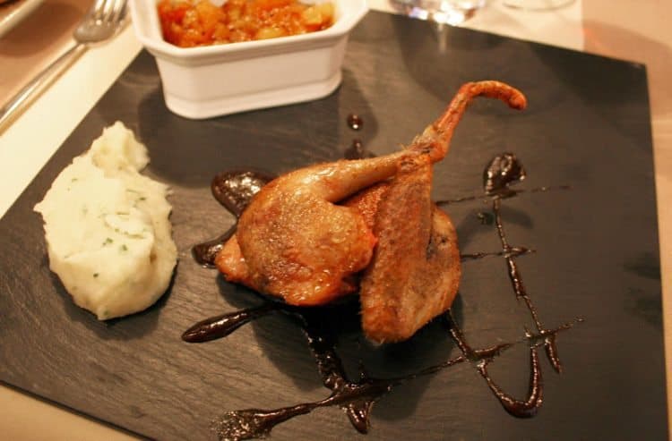 Roasted pigeon, a common delicacy in France.