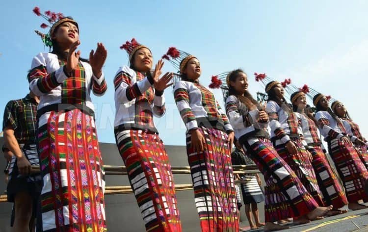 Members of the Adi Tribe dancing in India.