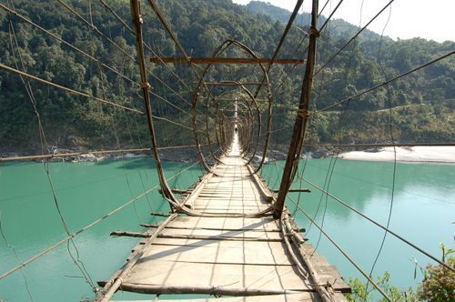 Cross a suspension bridge over the Siang River