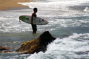 A surfer in Rincon, Puerto Rico: This island is very gay friendly.