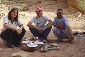 Egypt: Hiking in the Sinai Musa, Shadi and I at the end of a good meal