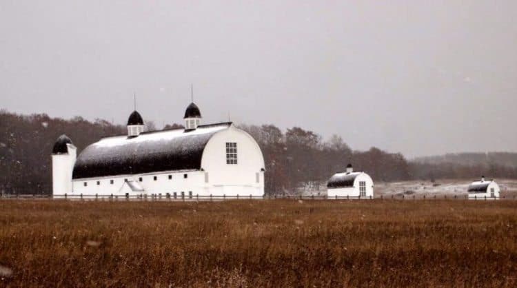 Traverse City Michigan: A Favorite Getaway 1 Outside of Traverse City heading toward the Sleeping Bear Dunes National Seashore, these two barns lie quietly in the snow.