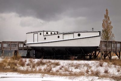 A great lakes fishing vessel with enclosed top, where men worked during the cold months.