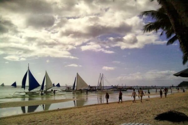 Sailboats on White Beach, on Boracay, Philippines. Caryl Estrosas photos.
