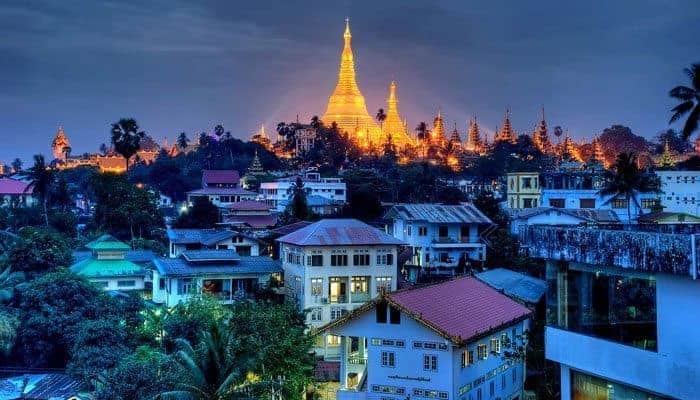 The Shwedagon Pagoda glowing in the evening light 