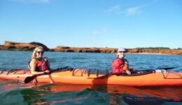Sea kayaking in Pleasure Bay, Magdalen Islands.