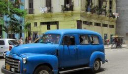 An old van drives the streets of Havana, Cuba.