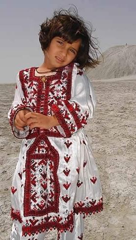 A local girl with handicraft clothes.