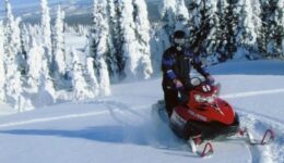 Sober travel: Snowmobiling in Big Sky, Montana. Absolute Travel photos.