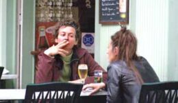 Smokers are easy to find in French cafes.