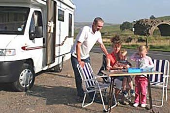 A family enjoying their motor home swap vacation on wheels