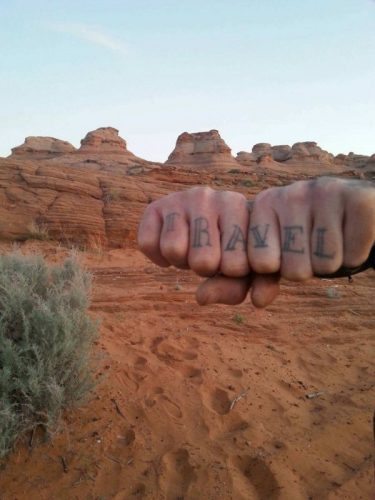 Brian Zygmontowicz, or "Ziggy", shows off his tattoo.