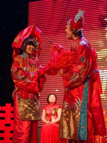 Westerners at a Chinese Wedding: Inner Mongolia 2 Luke unveils Dolly's face. Photo by James Pope.