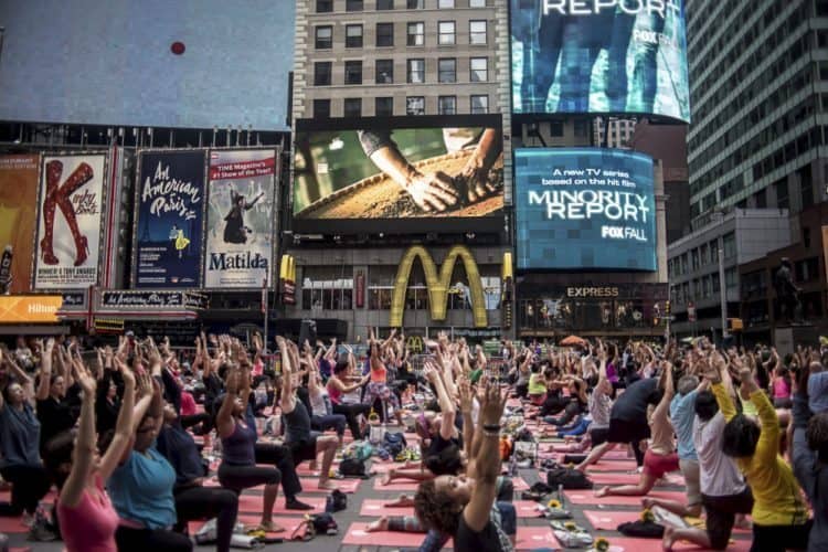 New York City: Yoga in Times Square 3 Yogis participate in the Solstice event in Times Square