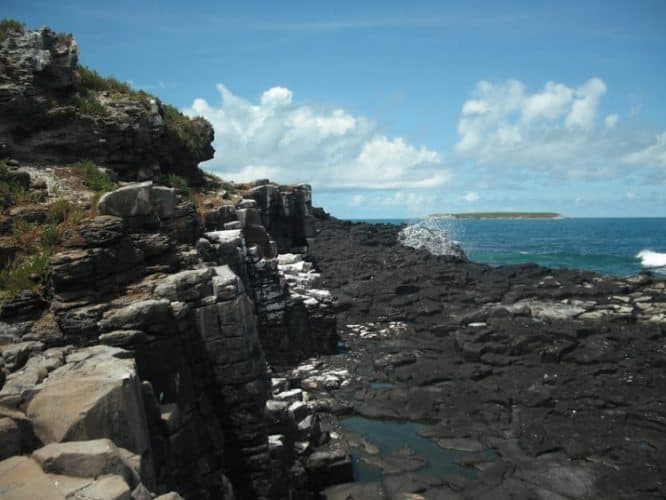 Tiny rocks on way of the ocean's tide.