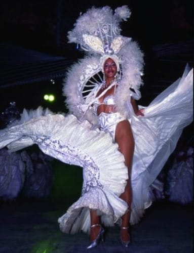 Tropicana Club dancers representing different god and goddesses of the Santería belief.