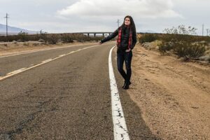 An Authoritative Guide to Hitchhiking as a Woman female-hitchhiker