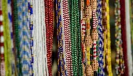Colored glass beads known as Elekes, all worn based on when you were born and your affiliated saint.