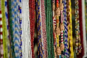 Colored glass beads known as Elekes, all worn based on when you were born and your affiliated saint.