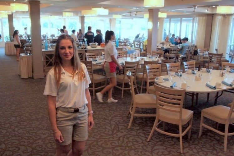 Ocean View Dining Room, with great views of the sand and surf. This staff member is from Bulgaria. 