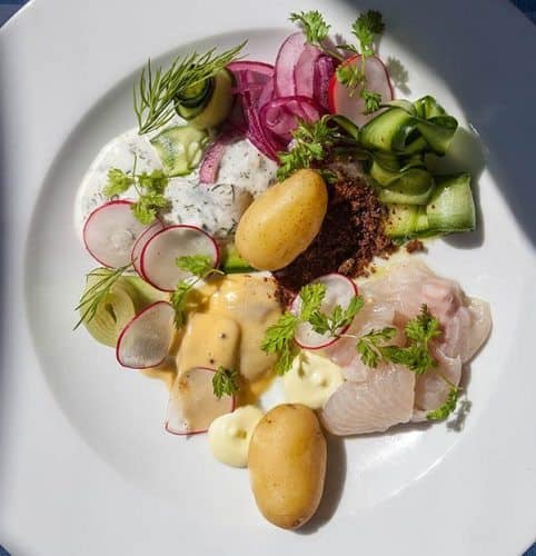 Paven restaurant. Fish platter: selection of local small fishes, three different Baltic herrings, whitefish, new potatoes and gherkins.
