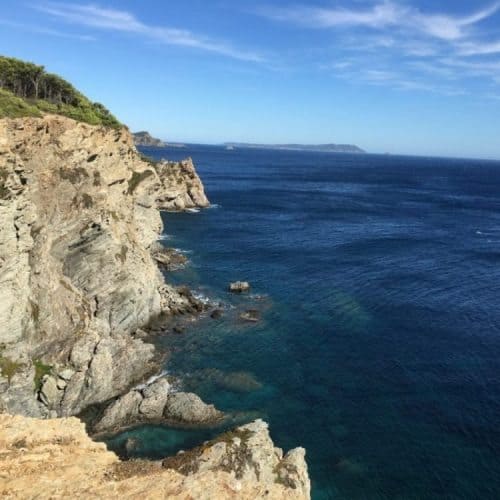 Dramatic cliffs off the coast of Porquerolles, an island near Hyeres, France. Max Hartshorne photos.