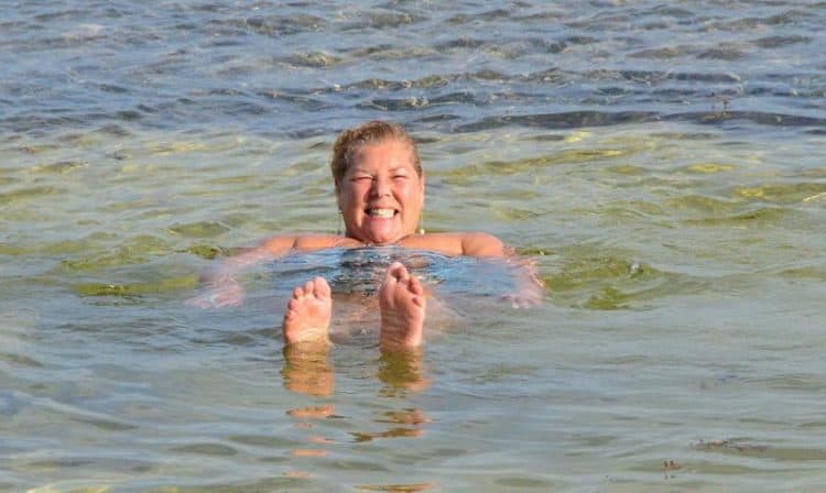 Debbie Klauber enjoys a swim in Belize, where she lives for six months out of the year.