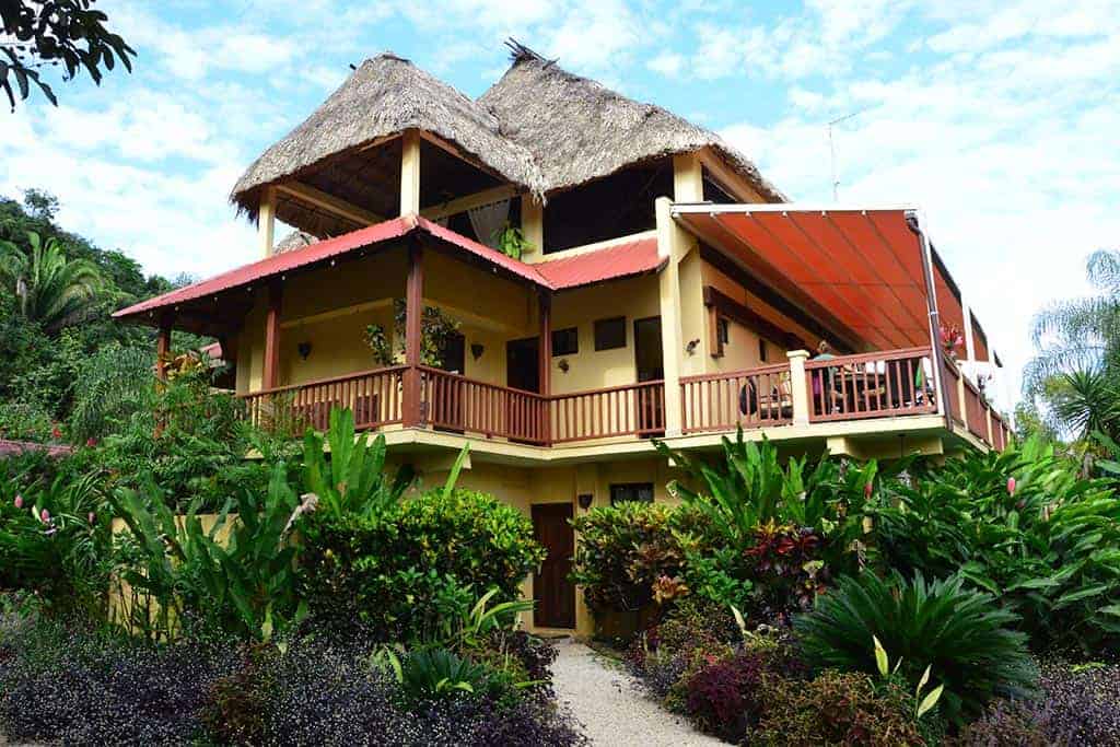 Guests of Sleeping Giant Rainforest Lodge can enjoy alfresco lunch overlooking colorful jungle gardens and dinner under a canopy of stars.