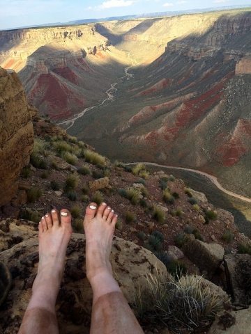Taking my boots off while overlooking Kanab Canyon after a dirty day of hiking.