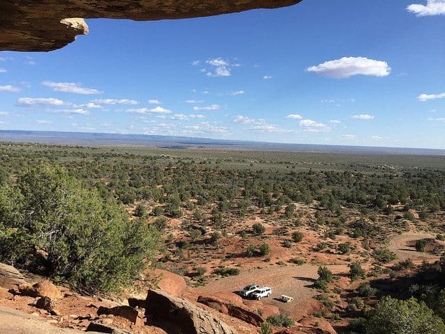 Looking down at our Toyota neighborhood parked at The Clamshell campsite in Fredonia, AZ. The campsite is named for a nearby rock art panel that appears to depict a clamshell.