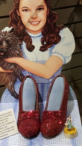 Dorothy with commemorative ruby slippers K.D. Leperi