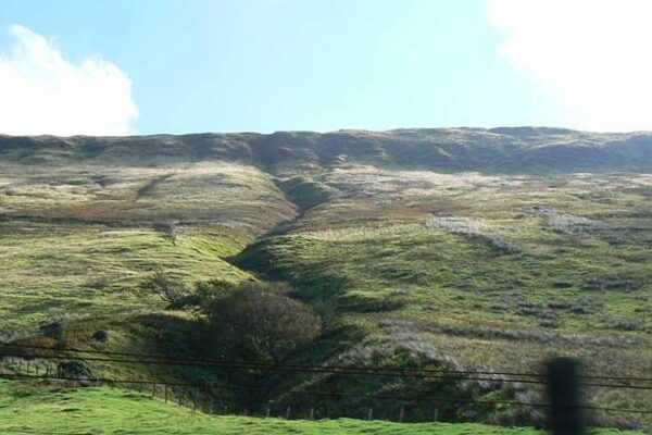 Distant mountains form the border of the horizon in Southern Wales.