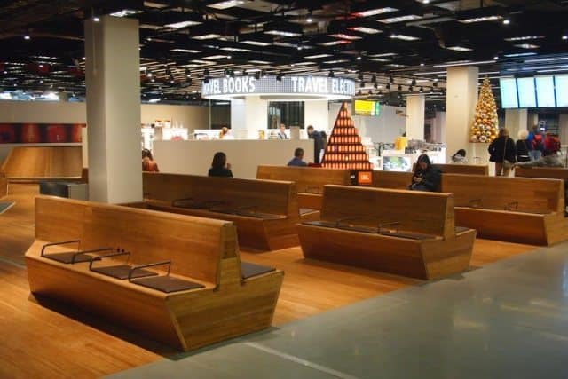 Low light and wood furniture makes the airport feel more comfortable.