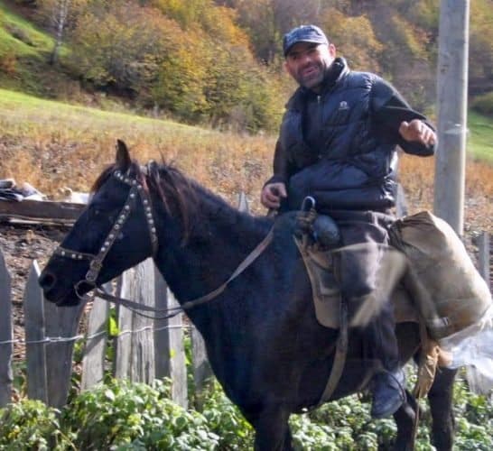 A local travels on horseback in Svaneti. Max Hartshorne photo.