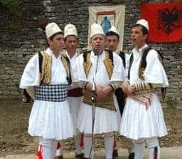 Traditional iso-polyphonic singers at the Gjirokastra Folk Festival. Gjirokastra.org photo.
