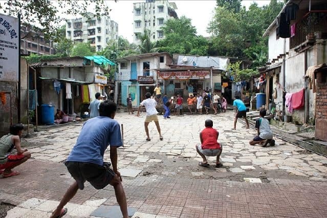 Playing cricket in the streets of Mumbai.