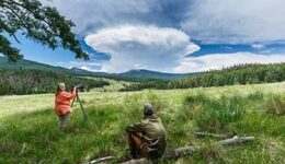 Photographer and Cumulonimbus capillatus
