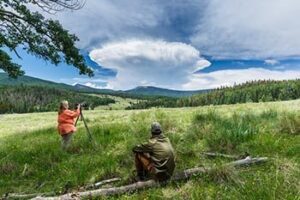 Photographer and Cumulonimbus capillatus