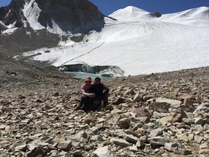 The highest elevation of the trip, Uween e Sar Pass at 4887 meters. Bernadine and Anna taking a well-earned rest after the challenging walk to the top.