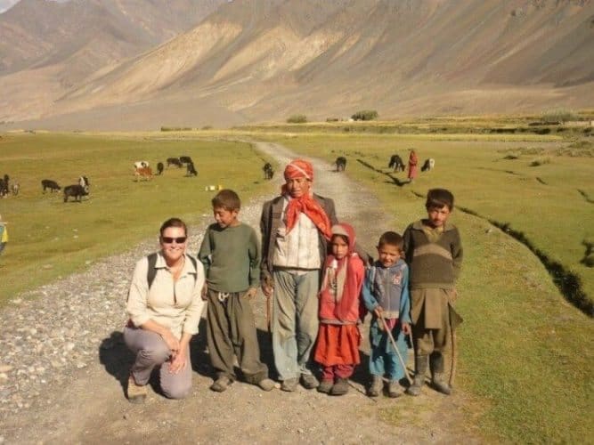 The end of the road, and the start of the two-week trek, the author at Sarhad e Broghil, being farewelled by the local Wakhi children.