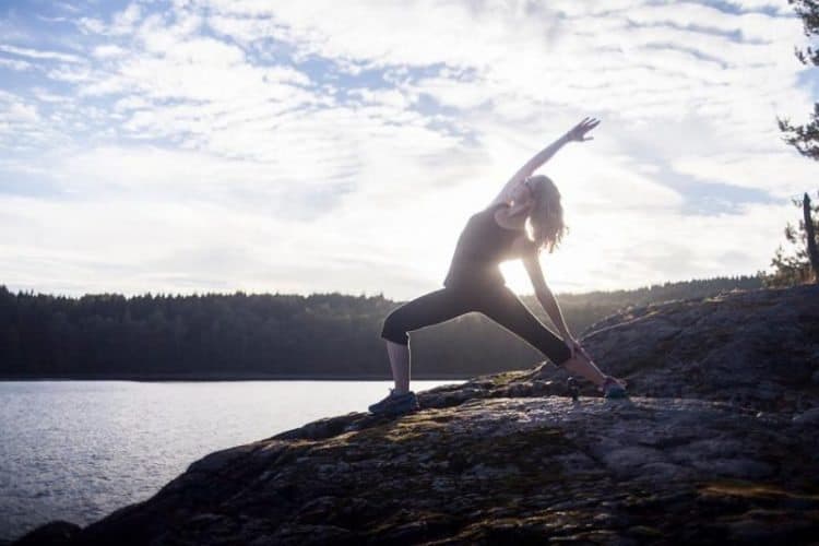 West Sweden: Paddle Through Dalsland 6 Brianna practiced yoga before we hiked up to the overlook.