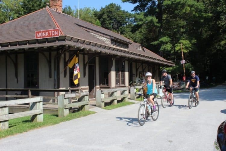 Bike riders in front of Monkton Station NCR Trail