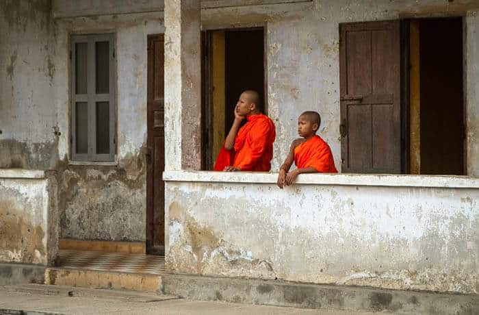 Young monks get an education about their country's terrible period in the 1970s when mayhem ruled.