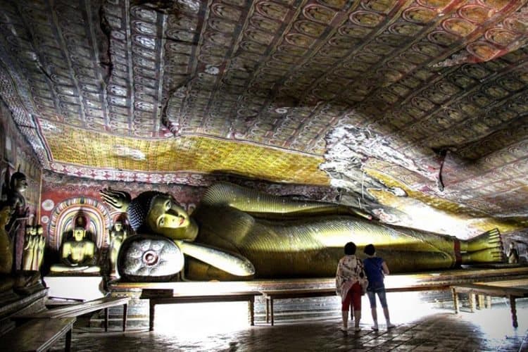 The Maha Alut Viharaya or Cave of Great New Temple at the Dambulla Cave Temple was constructed by King Kirti Sri Rajasinha who lived from 1747-1782 AD and features this 30-foot long reclining Buddha. Kim Schneider photos.