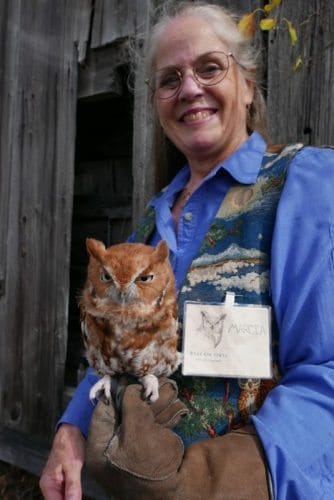 Marcia of Eyes on Owls with one of her birds at the festival.