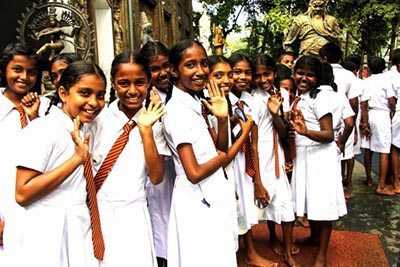 "What is your name?" is the question posed by a few dozen gleaming school girls to some Americans also visiting a popular Sri Lankan temple in Colombo.