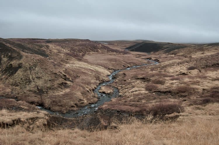 A river stretches into the horizon not far from Geysir in Iceland.