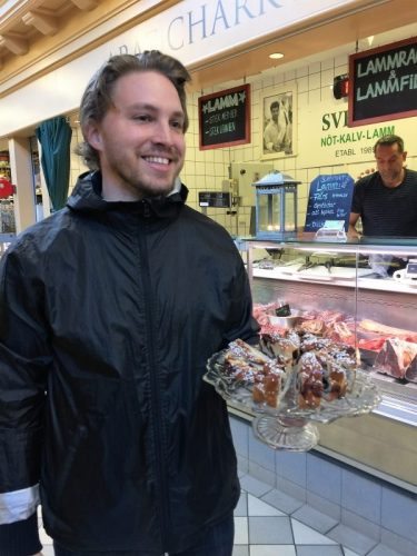 Tour guide Jesper Adolfsson offers guests sweet pastries during a foodie walking tour of Gothenberg, Sweden, where giant cinnamon rolls, tables spilling onto cobblestoned streets and probably the best chocolate café in Sweden all await.