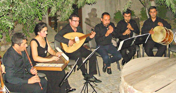 World-touring Gurdjieff Ensemble in Villa Kars courtyard.