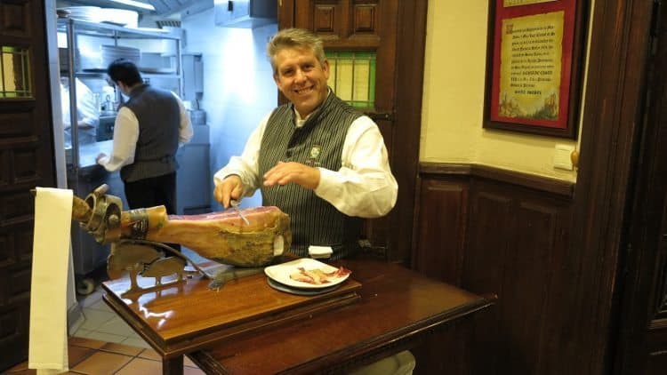 Aged Jamon (ham) expertly sliced table-side at, Mason de Jose Y Maria, a well-known local restaurant in Segovia.